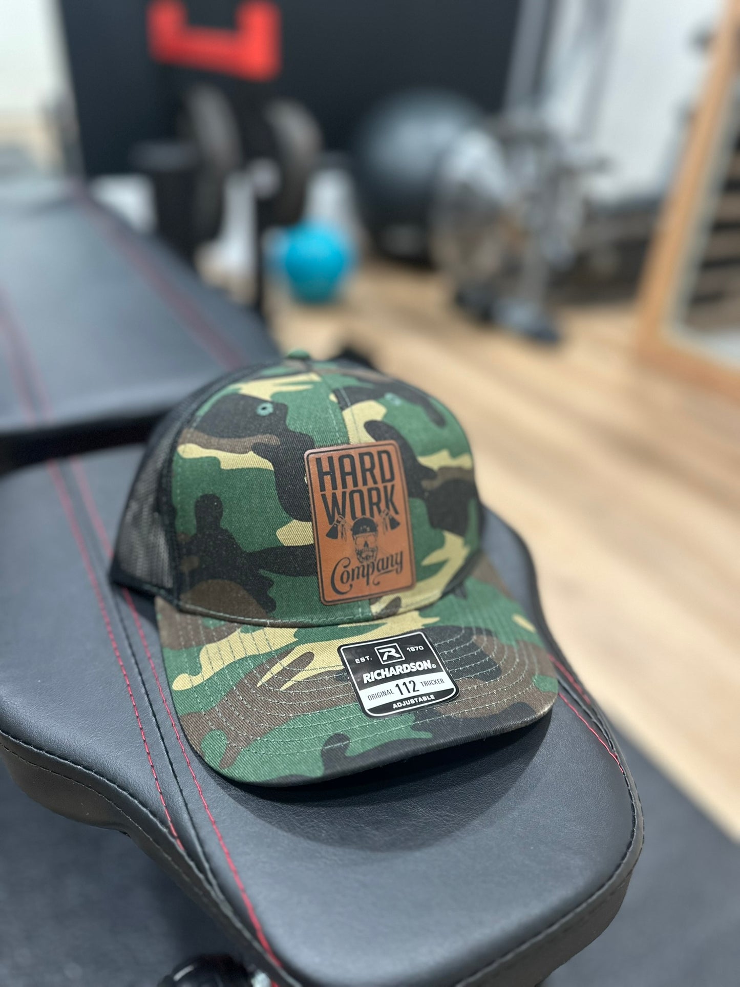 THE BRAND SNAPBACK TRUCKER HAT