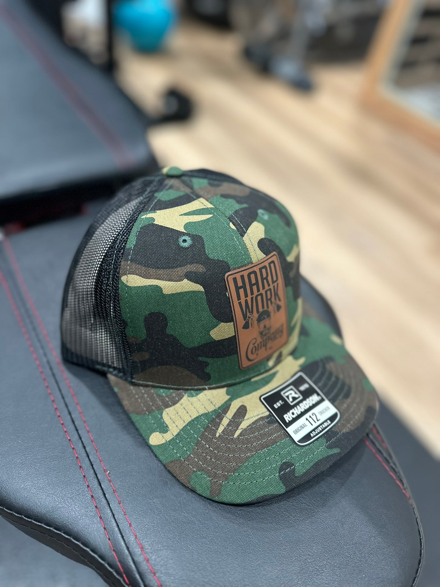 THE BRAND SNAPBACK TRUCKER HAT