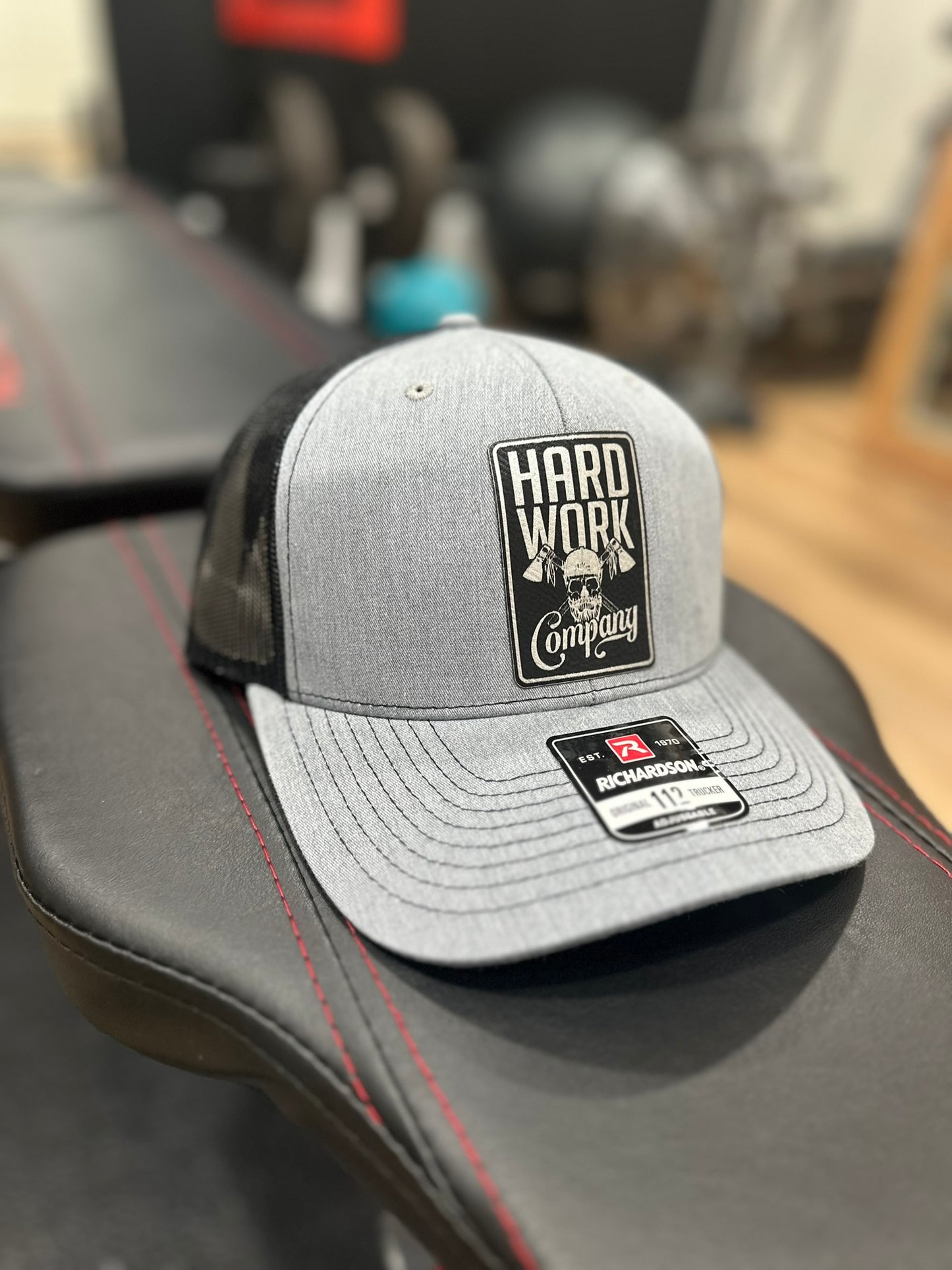 THE BRAND SNAPBACK TRUCKER HAT