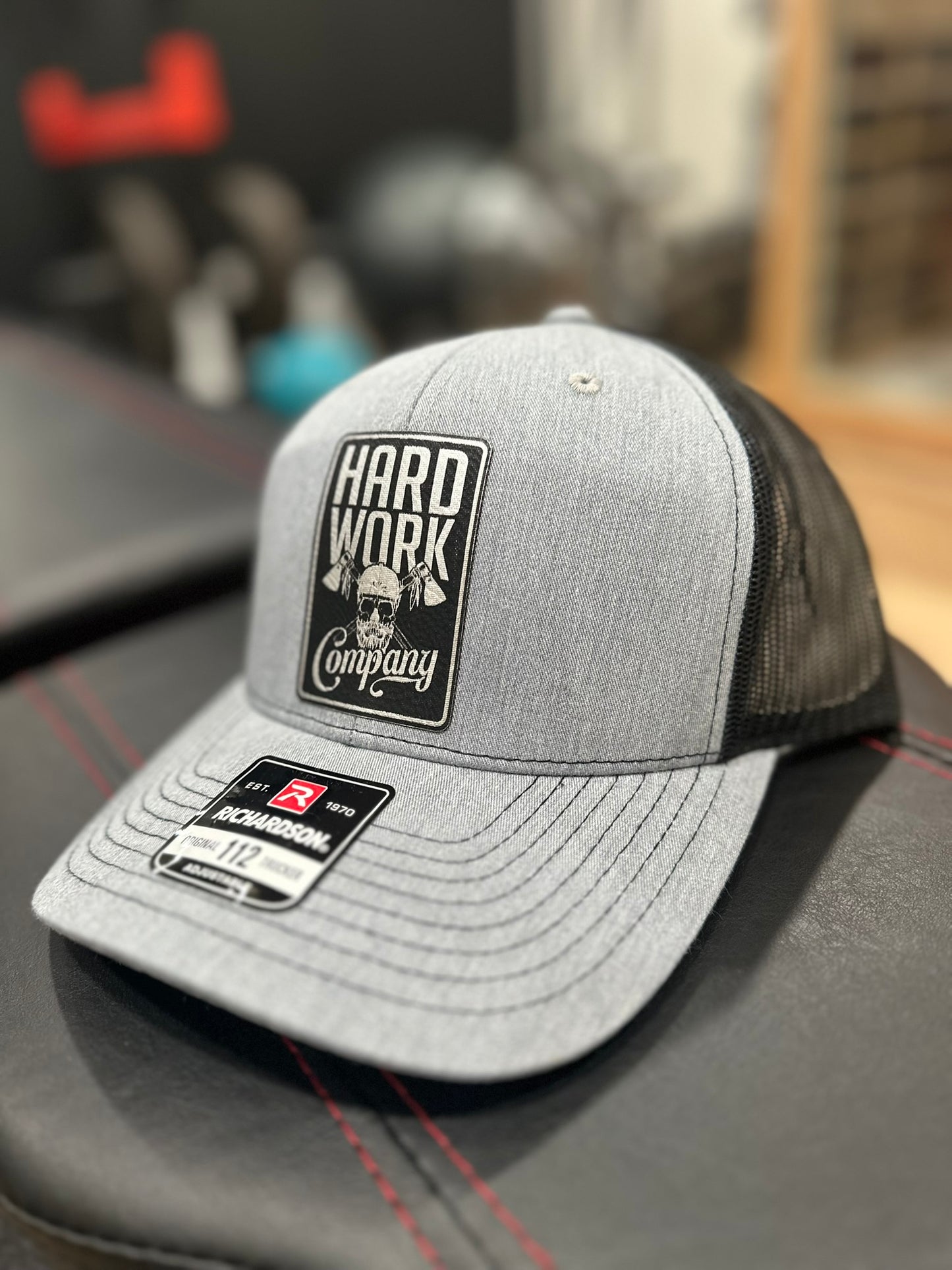 THE BRAND SNAPBACK TRUCKER HAT