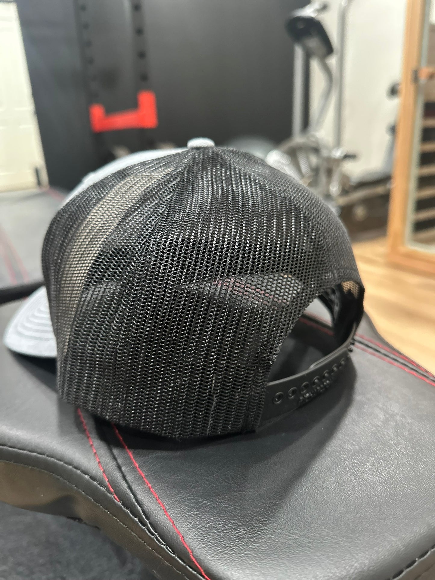 THE BRAND SNAPBACK TRUCKER HAT