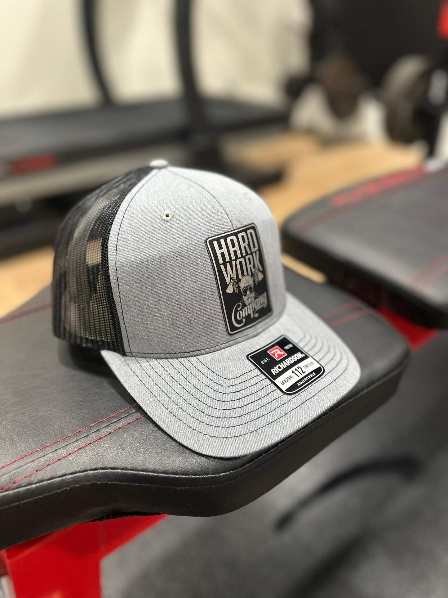 THE BRAND SNAPBACK TRUCKER HAT