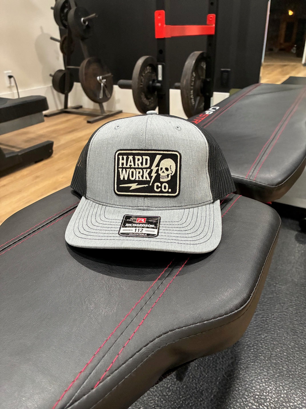 THE HARD WORK CO. TRUCKER HAT