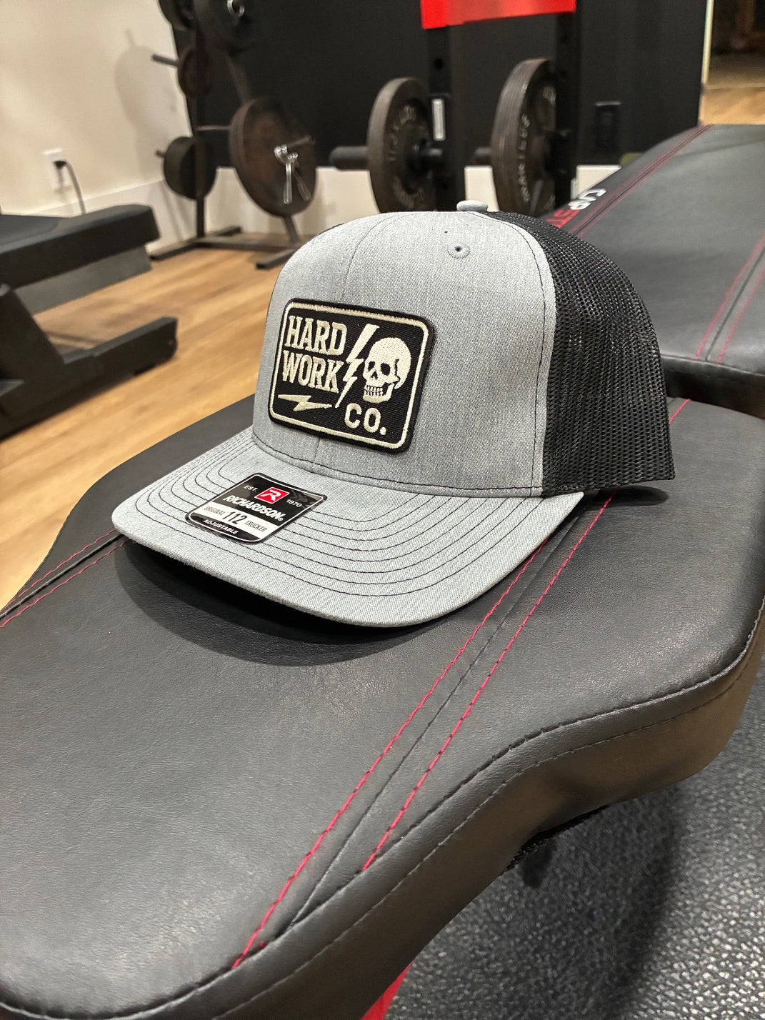 THE HARD WORK CO. TRUCKER HAT