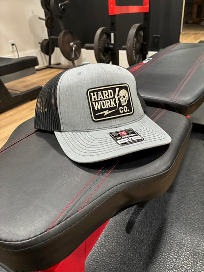 THE HARD WORK CO. TRUCKER HAT